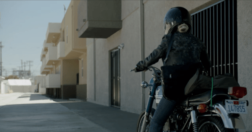 Do people actually wear messenger bags while they ride motorcycles?