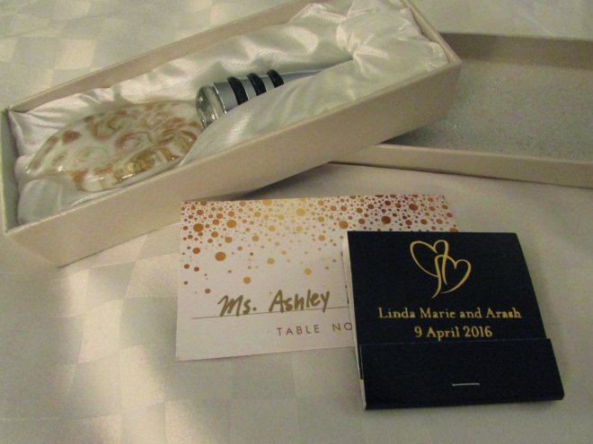 I absolutely love this beautiful glass wine stopper that was wrapped at my seat at the reception. So lovely!